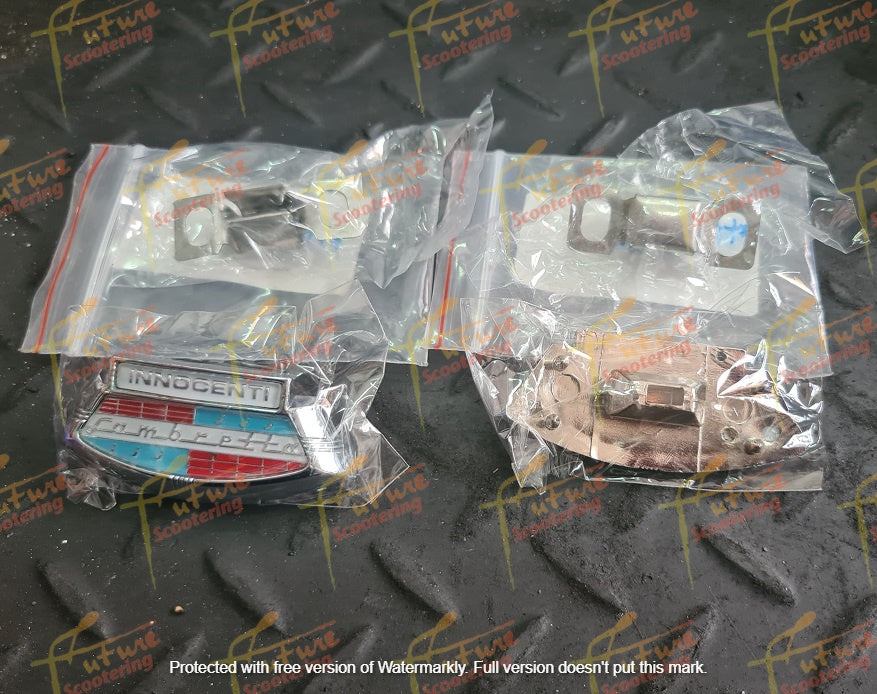 Lambretta Emblem Logo Badge "INNOCENTI Lambretta" Horn Cover (Genuine Lambretta Spare Part 19250071 - 19950069)